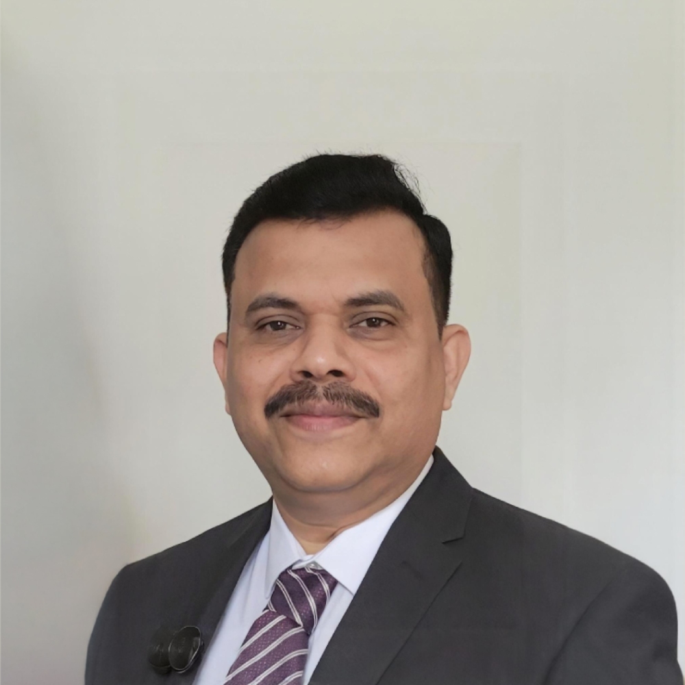 Mr Minu Thomas
